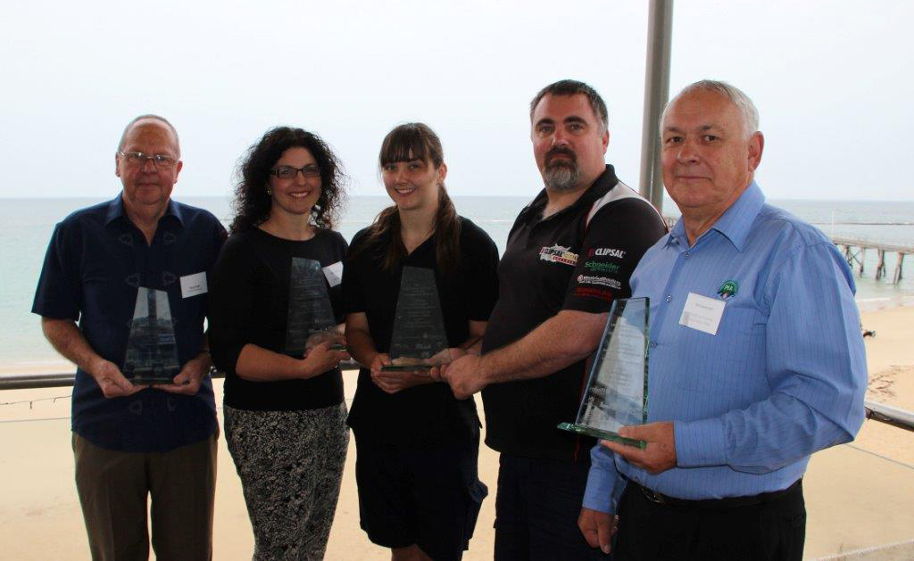 Rob Kavanagh (far right) with our award, alongside the other award recipients.